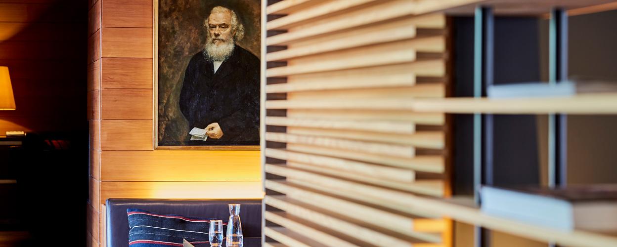 portrait von herman greulich im café hermans wohnzimmer